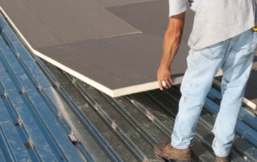 benefits of insulating Llechcynfarwy flat roofing